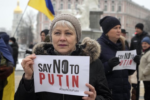 Activists hold posters during a SayNOtoPutin rally in Kiev, Ukraine, on January 9, 2022.