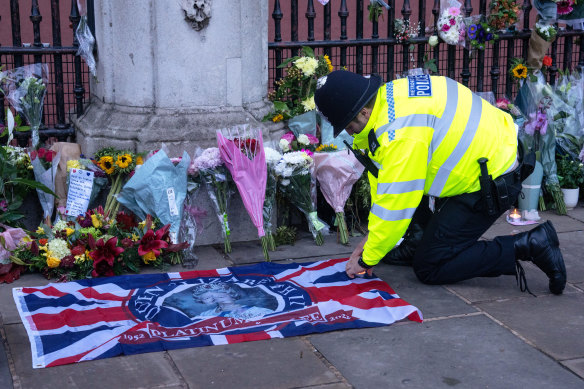 Tributes outside Buckingham Palace on Friday. 