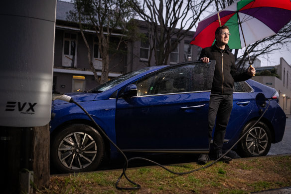 Eddy Blaxell does not have off-street parking at his rented home in Newtown and bought an electric vehicle only once a public charger was installed nearby.