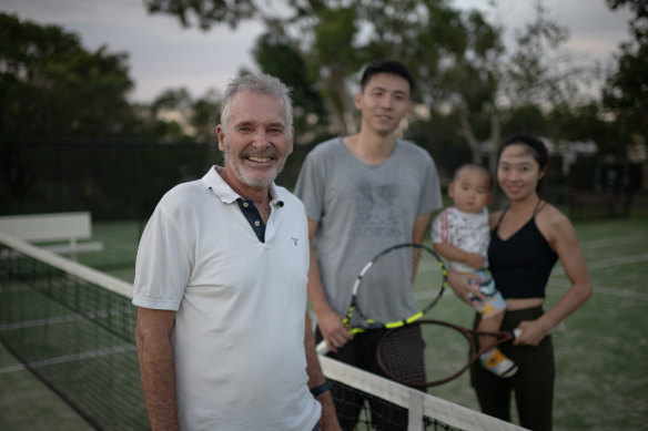 Former Longueville Tennis Club President Bruce Hogan with local players Will and Christina Hong, and young Alfred.