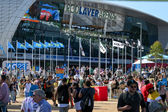 Fans move around the outside of Rod Laver Arena on Friday.