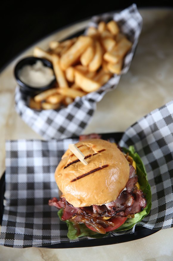 A “tradesman’s burger” and fries at the Palisade Hotel, Millers Point.
