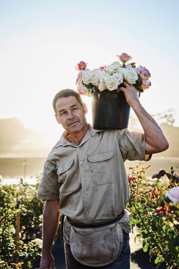 Ashley Wren with some of the peonies and roses grown on Crofters Fold Estate, near Kyneton in Victoria.