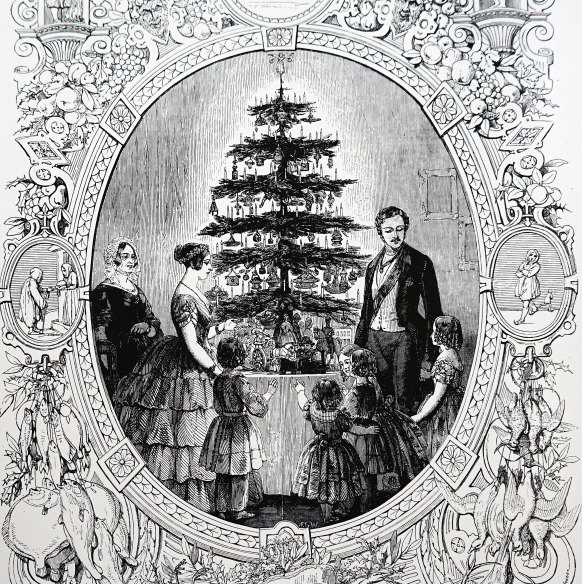 Prince Albert, Queen Victoria and their children surround a Christmas tree at Windsor Castle, England.