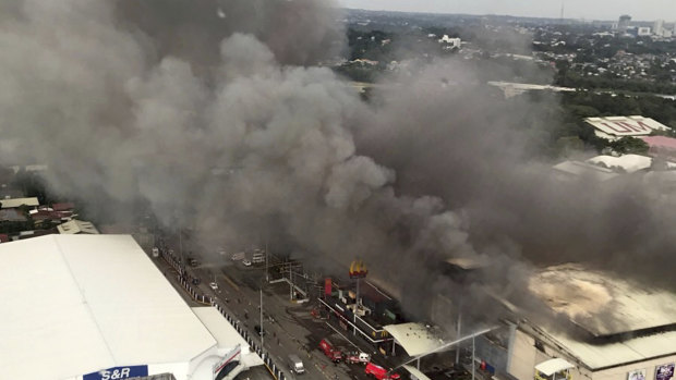 An aerial view of the fire, which raged for hours with people caught inside the shopping centre. 