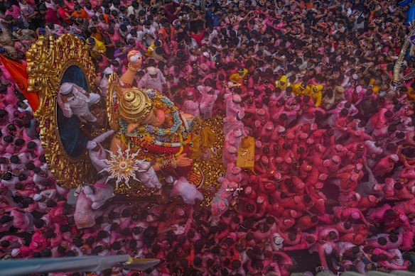 An idol of elephant-headed Hindu god Ganesha is taken for immersion on the final day of the ten-day long Ganesh Chaturthi festival in Mumbai, India.