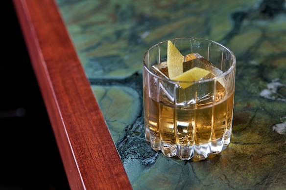 The house Old-Fashioned cocktail made with Bourbon infused with beef fat.