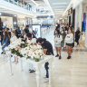 Dozens of bouquets and hundreds of moments of sorrow: Inside Westfield Bondi Junction