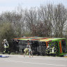 The coach came to rest on its side on the A9, near Schkeuditz, Germany.