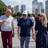 Prime Minister Anthony Albanese and his fiance Jodie Haydon walk along the Bund with former Socceroo and Shanghai Port FC Manager Kevin Muscat in Shanghai.