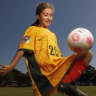 Zara, wearing Sam Kerr’s jersey,  dreams of emulating her hero and playing as a striker for the Matildas.