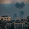 Smoke rising from Israeli air strikes on the city of Khan Younis, Gaza