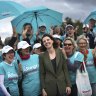 Allegra Spender celebrates her election win with supporters at Bondi Beach on Sunday.