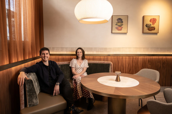 Josh and Julie Niland sitting in the new dining room. 