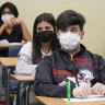 Tensions ignite as US schools suspend classes amid record COVID cases