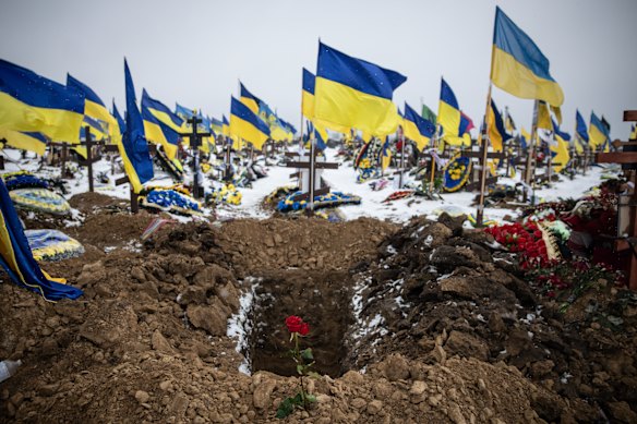 A single rose is seen at a freshly dug grave at 18 Cemetery in Kharkiv, Ukraine. Tuesday marked four years since Russia launched its full-scale invasion of Ukraine on February 24, 2022. 