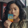 Katie Kim (Awkwafina) discovers she has won the lottery in Jackpot!