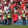 Fans of Morocco invade the pitch during the Men’s group B match between Argentina and Morocco.