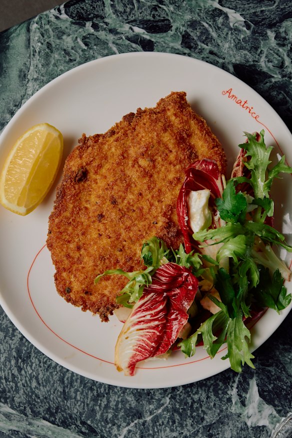 Chicken cotoletta with fresh endives and creamy feta. 
