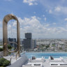 The rooftop pool, sun lounges and an extraordinary swing.