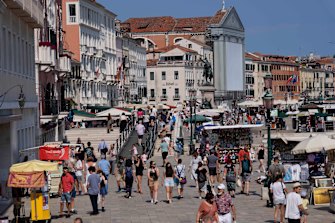 Tourists return to Venice this month.