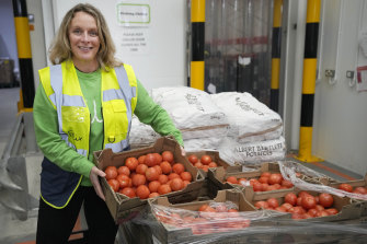 Rachel Ledwith from the charity ‘The Felix Project’ collects food at their storage hub in London.