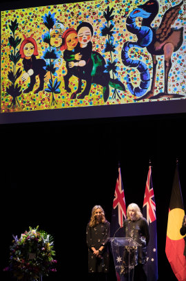 Kendrah Morgan, left, and Lesley Harding, from Heide Museum of Modern Art speak at Mirka Mora's State Memorial service.