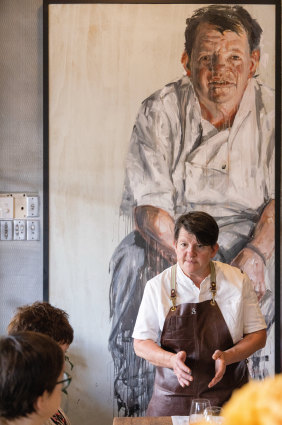 Annie Smithers in front of Daniel
Butterworth’s portrait of her, a finalist in the 2016 Archibald Prize.