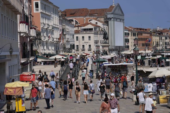 Tourists return to Venice this month.