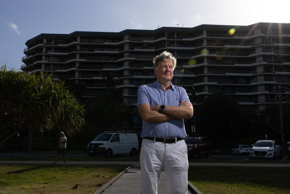 Greg Melloy in front of his Gold Coast apartment building.