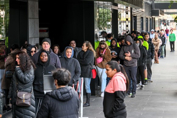Applicants queued up for at least three hours in Melbourne to check on the status of their passports.