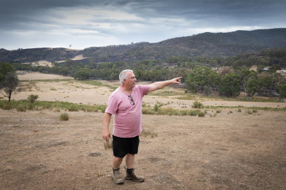 Bob Horvath shows how the fire was approaching his place near Glenlogie  last week.