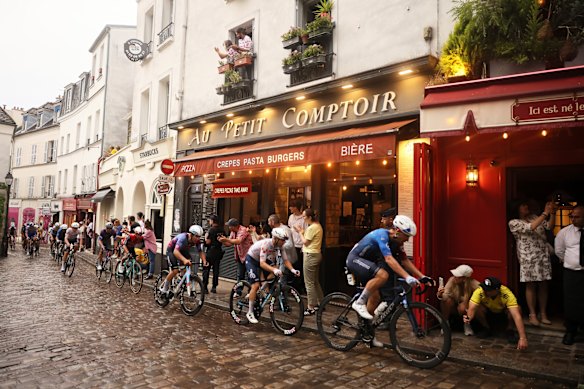 Hours before the peloton was due to arrive, spectators had already packed the Parisian neighbourhood.