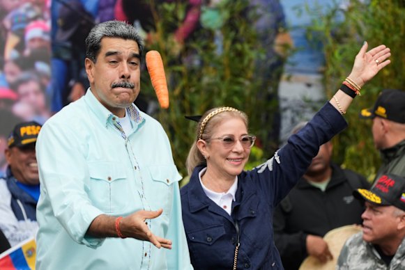 Venezuelan President Nicolas Maduro and his wife, Cilia Flores, in Caracas on December 10.