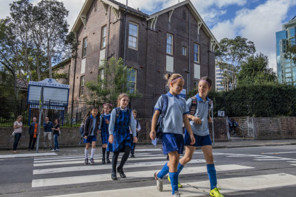 Parents and students outside Chatswood Public School. 