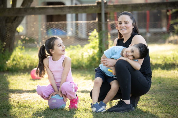 Maria Abraham with two of her children, Scarlett and Levi. The family relocated from Co<em></em>ncord to Maraylya in the north-west.