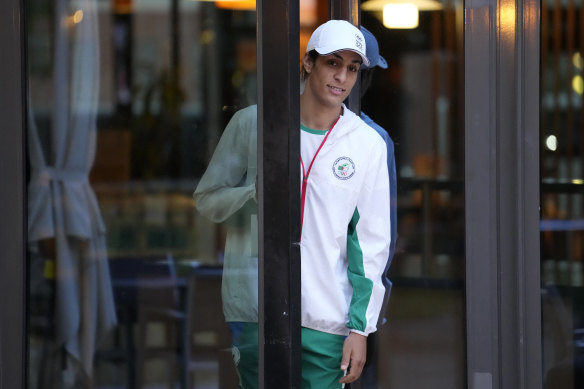 Algerian boxer Imane Khelif leaves after an interview with SNTV at the 2024 Summer Olympics.