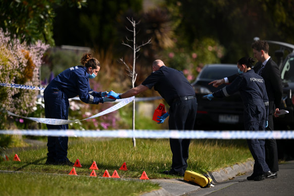 Police gather evidence from a Janmara Court home in Endeavour Hills after a sleeping boy was injured in a hail of gunfire.