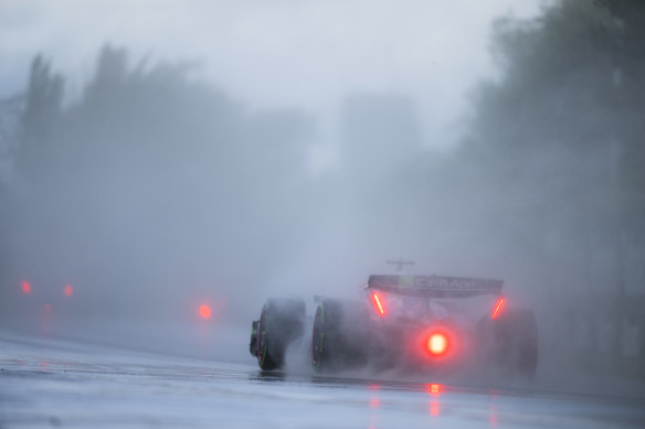 Ricciardo drives on a wet track in Montreal.