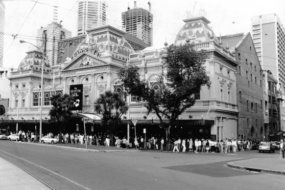 People queue for tickets to see The Phantom of the Opera at Princess Theatre.