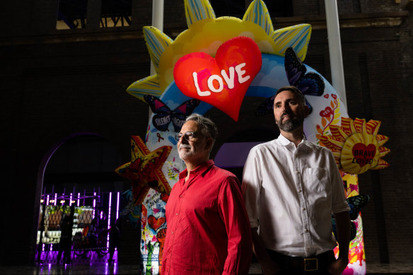 Artists Maurice Goldberg (left) and Matthew Aberline (right) with their artwork, ‘Fabulous: Acts of Protest and Celebration’. 