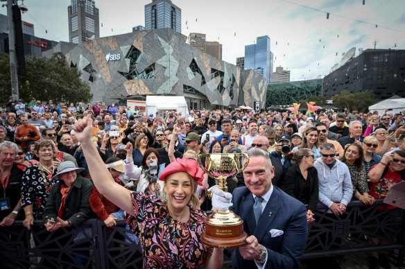 Melbourne Lord Mayor Sally Capp and Victoria Racing Club chairman Neil Wilson with the Melbourne Cup parade crowd at Federation Square last year.