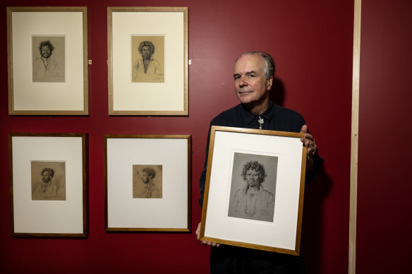 Art historian Dr David Hansen with a portrait of an Indigenous man known as Sangrado, by colonial artist Charles Rodius. 