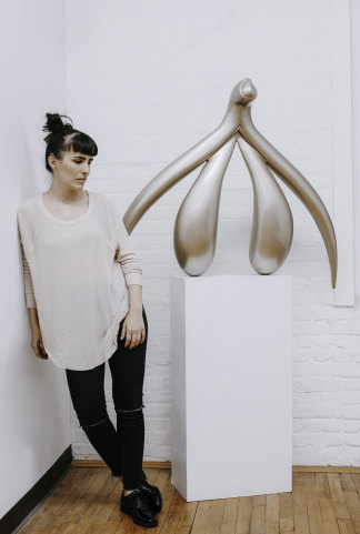 New York artist Sophia Wallace with her clitoris sculpture, Adamas (Unconquerable).