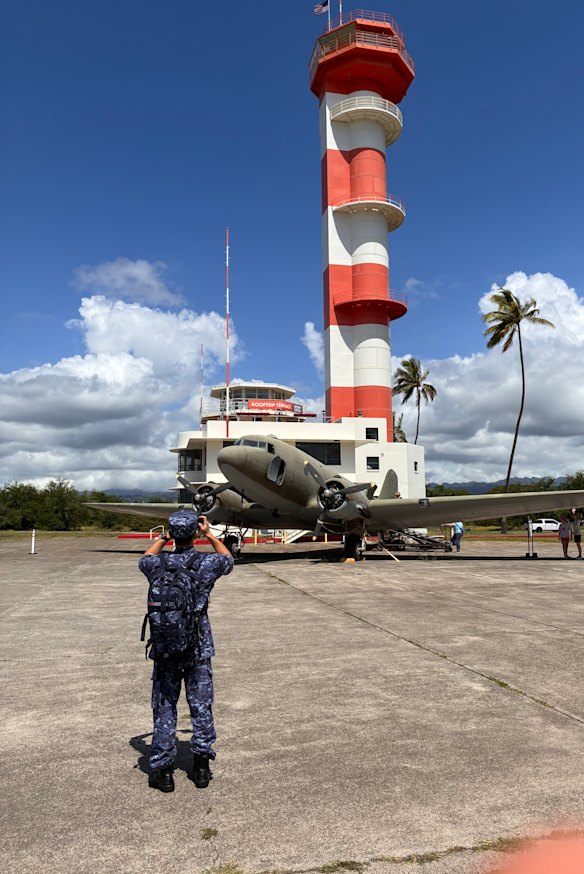 Today a Japanese Self-Defence Force member takes a picture of the Ford Island Control Tower. 