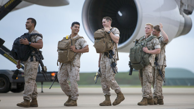 US Marines embark an aircraft at RAAF Base Darwin for their return home.