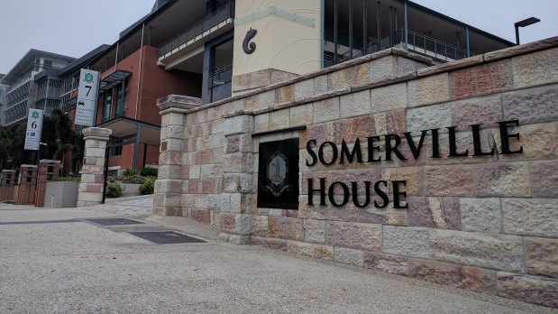 The security guard was allegedly stabbed in a classroom at Somerville House.