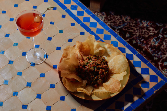 Grass-fed beef tartare, ras el hanout, eschalots, gaufrette potatoes at Kasbah.