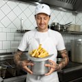 Elvis Abrahanowicz with his hand-cut chips at served at Joe's Tavern and Mister Grotto in Sydney.