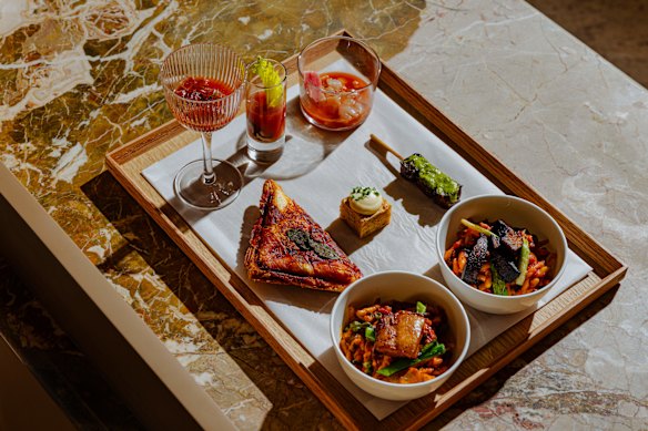 Gazpacho Bloody Mary, wagyu beef pintxos, jamon Iberico, plus more snacks at Dark Mode. 